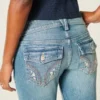 Lavtaljede jeans med medium vask og broderede blomster og bootcut-ben Lavtaljede jeans med medium vask og broderede blomster og bootcut-ben