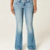 Lavtaljede jeans med medium vask og broderede blomster og bootcut-ben Lavtaljede jeans med medium vask og broderede blomster og bootcut-ben