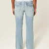 Lavtaljede jeans med mellemvask og broderet sommerfugl i bootcut-pasform Lavtaljede jeans med mellemvask og broderet sommerfugl i bootcut-pasform