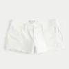Lavtaljede mini-shorts i hvidt denim med distressed-look