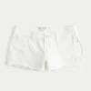 Lavtaljede mini-shorts i hvidt denim med distressed-look