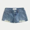 Lavtaljede mini-shorts i mediumvasket denim med distressed-look