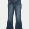 Lavtaljede mørkvaskede bootcut-jeans med bælte Lavtaljede mørkvaskede bootcut-jeans med bælte