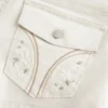Lavtaljede poplin-shorts med blomsterprint og baglommer Lavtaljede poplin-shorts med blomsterprint og baglommer
