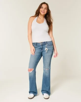 Lavtaljede, rippede bootcut-jeans i medium vask