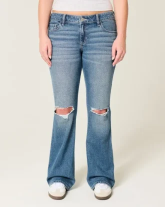 Lavtaljede, rippede bootcut-jeans i medium vask