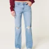 Lavtaljede, rippede jeans i medium vask med afslappet, lige pasform Lavtaljede, rippede jeans i medium vask med afslappet, lige pasform