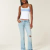 Lavtaljede, rippede, lysvaskede bootcut-jeans med broderi Lavtaljede, rippede, lysvaskede bootcut-jeans med broderi