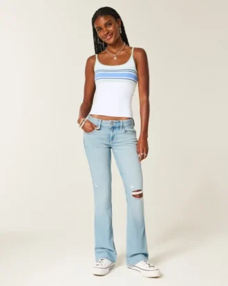 Lavtaljede, rippede, lysvaskede bootcut-jeans med broderi