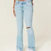 Lavtaljede, rippede, lysvaskede bootcut-jeans med broderi Lavtaljede, rippede, lysvaskede bootcut-jeans med broderi
