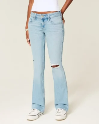 Lavtaljede, rippede, lysvaskede bootcut-jeans med broderi