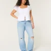 Lavtaljede, slidte, lyse, afslappede, lige jeans Lavtaljede, slidte, lyse, afslappede, lige jeans