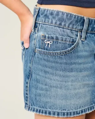 Lavtaljet denim miniskort med broderet sløjfe