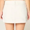 Lavtaljet hvid denim miniskort Lavtaljet hvid denim miniskort