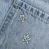 Lavtaljet mini-skort i denim med stjernebroderi Lavtaljet mini-skort i denim med stjernebroderi