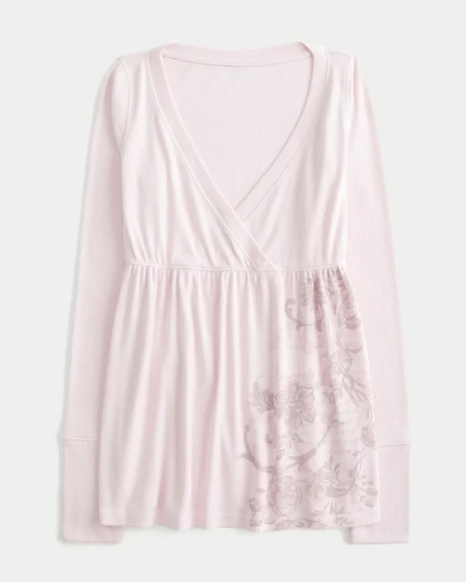 Let babydoll-top med lange ærmer og blomstermønster Let babydoll-top med lange ærmer og blomstermønster