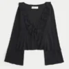 Let langærmet babydoll-top med flæser Let langærmet babydoll-top med flæser