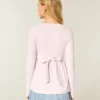 Let langærmet babydoll-top med kryds foran Let langærmet babydoll-top med kryds foran