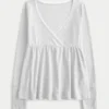 Let langærmet Pointelle Babydoll Top