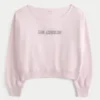 Let off-shoulder Los Angeles grafisk sweatshirt