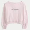 Let off-shoulder Los Angeles grafisk sweatshirt