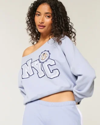 Let off-shoulder NYC grafisk sweatshirt