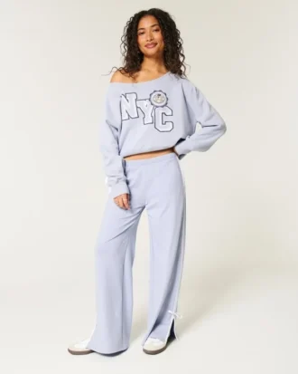 Let off-shoulder NYC grafisk sweatshirt