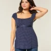 Let satin babydoll-top med bindebånd Let satin babydoll-top med bindebånd