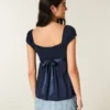 Let satin babydoll-top med bindebånd Let satin babydoll-top med bindebånd