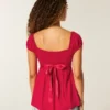 Let satin babydoll-top med bindebånd Let satin babydoll-top med bindebånd