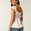 Let satin babydoll-top med bindebånd Let satin babydoll-top med bindebånd
