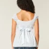 Let satin babydoll-top med bindebånd Let satin babydoll-top med bindebånd