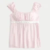 Let satin babydoll-top med bindebånd Let satin babydoll-top med bindebånd