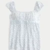 Let satin babydoll-top med bindebånd Let satin babydoll-top med bindebånd