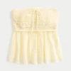 Let stropløs babydoll-top i blandet hæklet stof Let stropløs babydoll-top i blandet hæklet stof