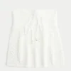 Let stropløs babydoll-top i hæklet stil Let stropløs babydoll-top i hæklet stil