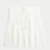 Let stropløs babydoll-top i hæklet stil Let stropløs babydoll-top i hæklet stil