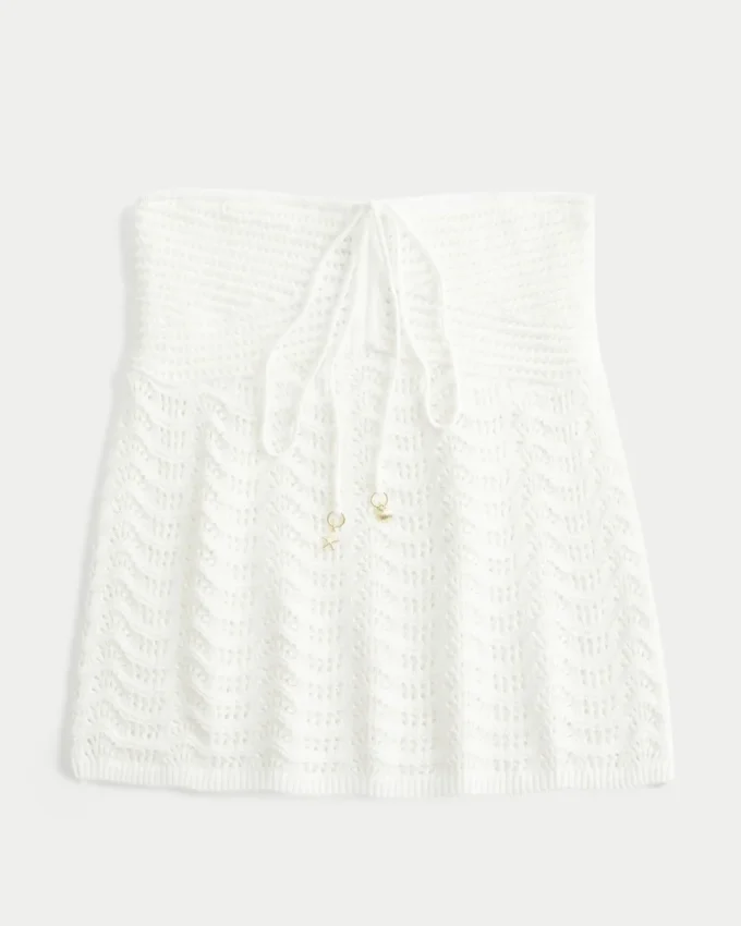 Let stropløs babydoll-top i hæklet stil Let stropløs babydoll-top i hæklet stil