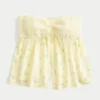 Let stropløs babydoll-top med smock ved brystet Let stropløs babydoll-top med smock ved brystet