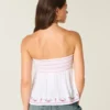 Let stropløs broderet babydoll-top Let stropløs broderet babydoll-top