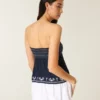 Let stropløs broderet babydoll-top Let stropløs broderet babydoll-top