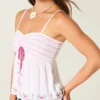 Let stropløs broderet babydoll-top Let stropløs broderet babydoll-top