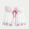 Let stropløs broderet babydoll-top Let stropløs broderet babydoll-top
