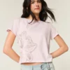 Let T-shirt med blomsterprint og bånd i ryggen Let T-shirt med blomsterprint og bånd i ryggen
