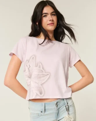 Let T-shirt med blomsterprint og bånd i ryggen