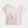 Let T-shirt med blomsterprint og bånd i ryggen Let T-shirt med blomsterprint og bånd i ryggen