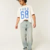 Letvaskede broderede terningeskaterbaggyjeans Letvaskede broderede terningeskaterbaggyjeans