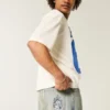 Letvaskede broderede terningeskaterbaggyjeans Letvaskede broderede terningeskaterbaggyjeans