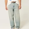 Letvaskede broderede terningeskaterbaggyjeans Letvaskede broderede terningeskaterbaggyjeans
