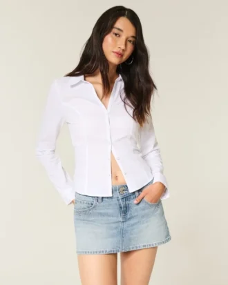 Letvasket mini-skort i denim med nitter